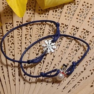 Blue Bracelet with Snowflake and Snowman Pearl Style Charm Super Cute Set Of 2